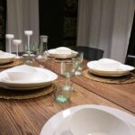 Piatti moderni per la sala da pranzo: neri opachi o in vetro trasparente?